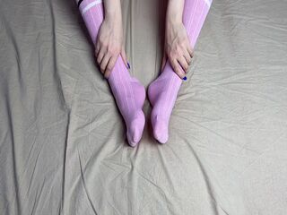 Pink socks in hands of mistress with blue nails in solo video